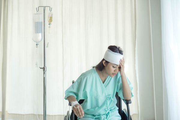 5 Most Stressful Life Changes - Woman in Hospital
